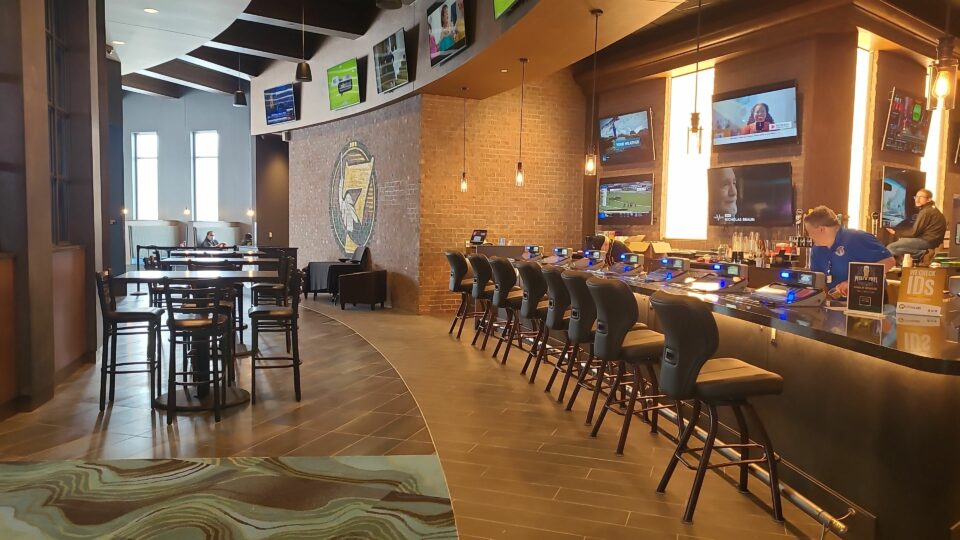 5. Pucks and pints bar on left side